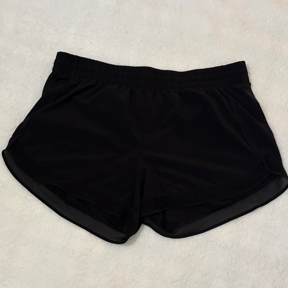 Athleta XL racer run 4” Black Women's Athletic Shorts